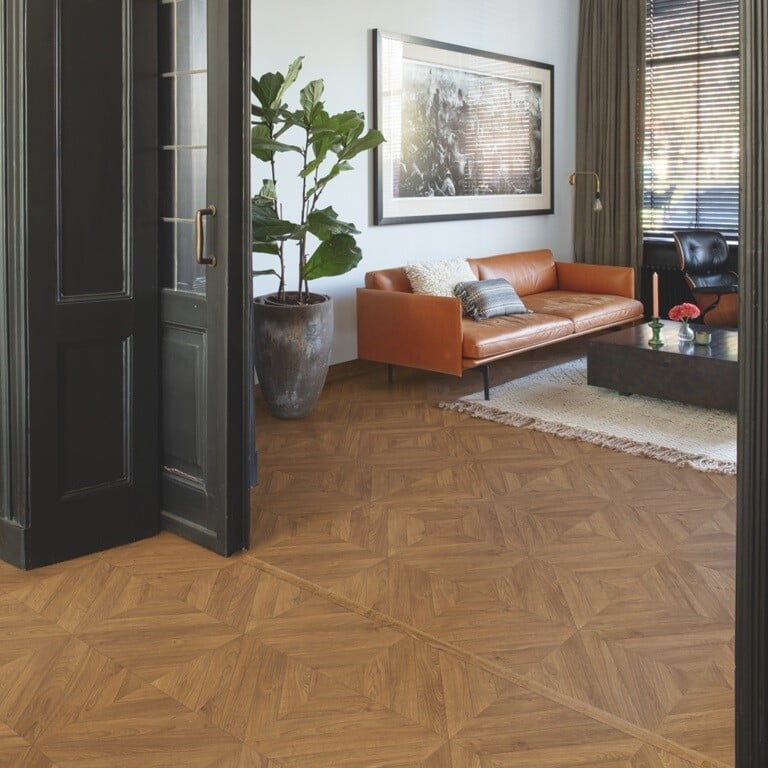 Impressive Patterns Chevron bruine eik woonkamer Laminaat patroon